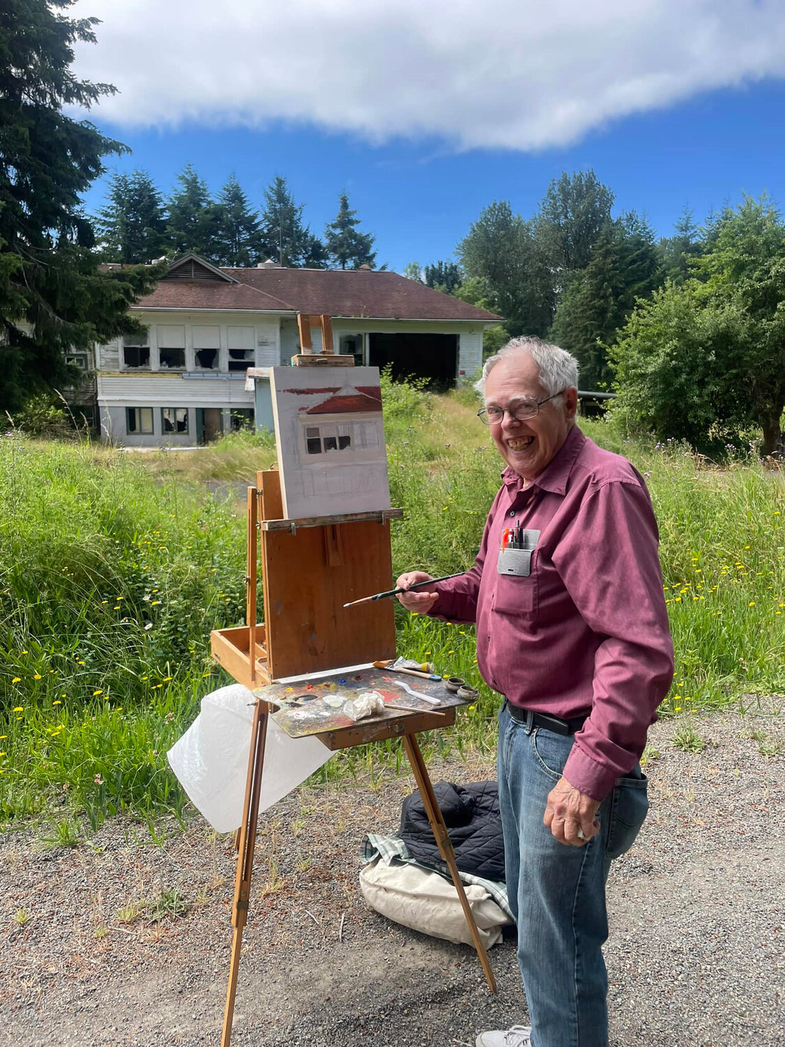 Chehalis artist Charlie Funk set up his easel to paint the old Dryad School from the Willapa Hills Trail, as photographed in July 2022 by Jammie Hoffman, who graciously provided this photo.